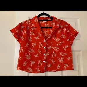 Short red cropped blouse loose